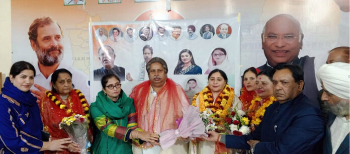 Senior Congress leaders felicitating new office bearer Inderjeet Kour in Jammu.