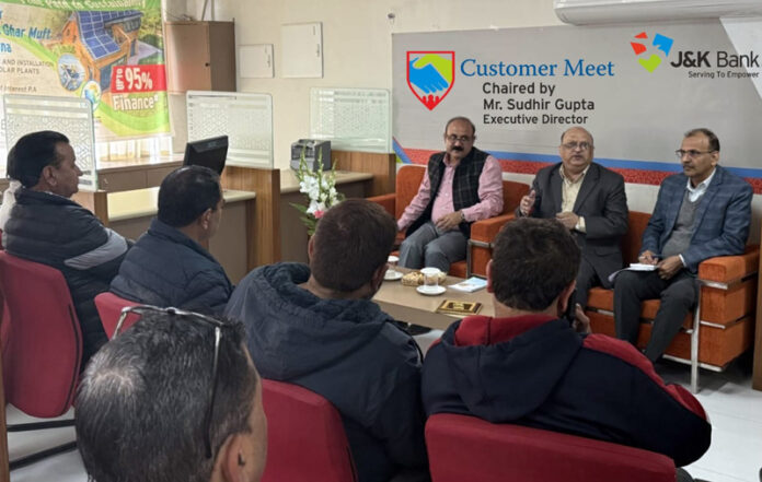 Dignitaries from J&K Bank interacting with the customers at the bank's Dharamshala branch in Himachal Pradesh on Monday.