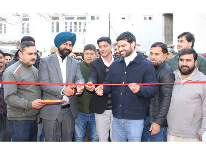 Page8-7 DC Doda inaugurating electric sub-station at CHC Thathri on Saturday.