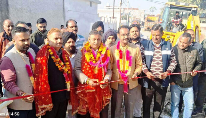 MLA Kathua, Dr Bharat Bhushan kick starting construction of drain in Kathua on Thursday. MLA Kathua, Dr Bharat Bhushan kick starting construction of drain in Kathua on Thursday.