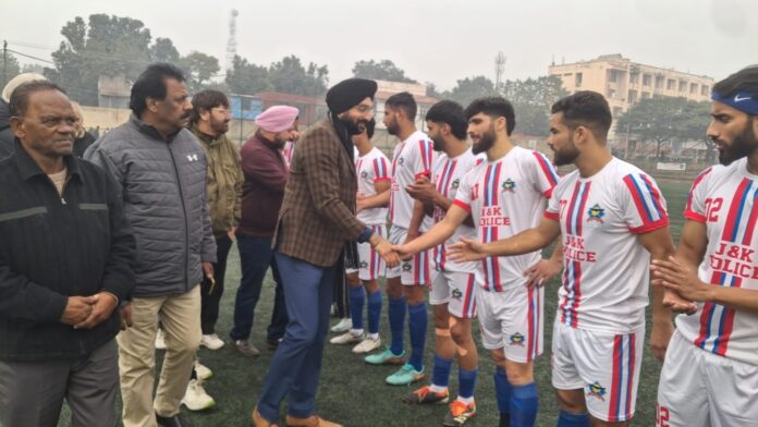 Dignitary interacting with players before start of match.