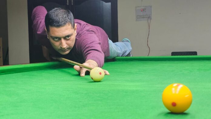 A snooker player in action during a match at MA Stadium. -Excelsior/Rakesh