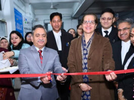 Justices Sanjeev Kumar and Sindhu Sharma inaugurating 4th National Lok Adalat in Jammu on Saturday.