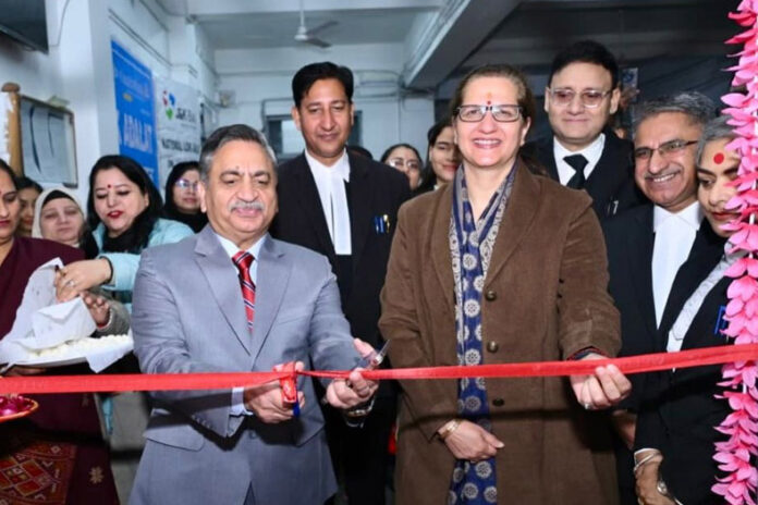 justice Justices Sanjeev Kumar and Sindhu Sharma inaugurating 4th National Lok Adalat in Jammu on Saturday.