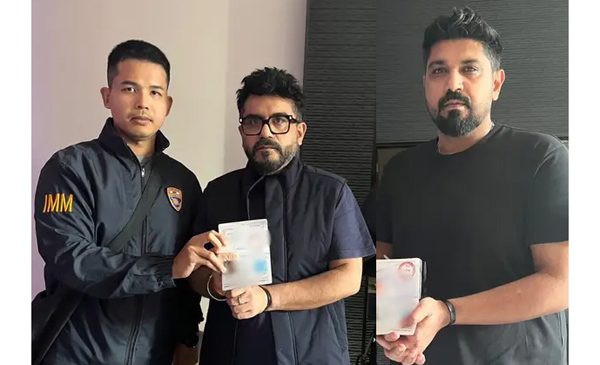 Handcuffed Luthra brothers in custody of authorities in Thailand. Handcuffed Luthra brothers in custody of authorities in Thailand.