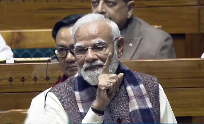 Prime Minister Narendra Modi speaks in Lok Sabha on Monday. (UNI)