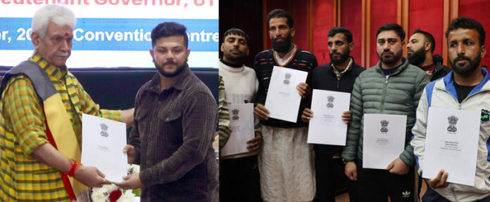LG Manoj Sinha handing over appointment letters to Next of Kins of victims of terrorism in Jammu on Thursday.