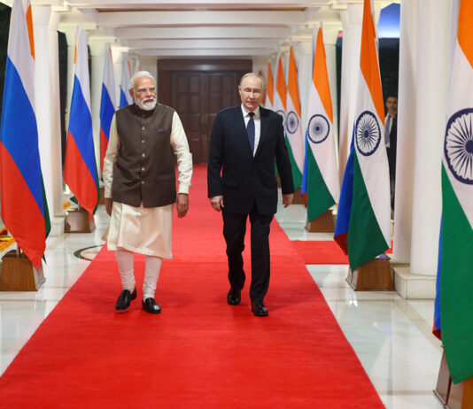 PM Narendra Modi along with Russian President Valadimir Putin at Lok Kalyan Marg in New Delhi on Thursday.