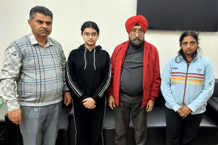 Ananyaa Kotwal posing along with officials of J&K Sports Council. Ananyaa Kotwal posing along with officials of J&K Sports Council.