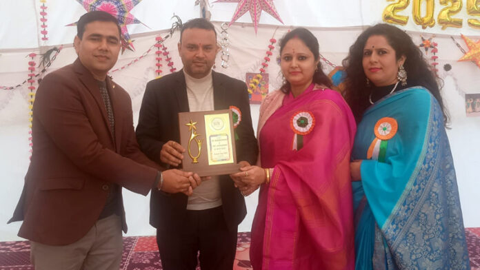 Dignitary being honoured by school management during a programme. Dignitary being honoured by school management during a programme.
