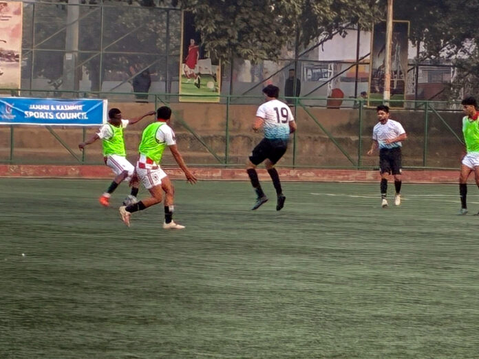 Football players in action during a match.