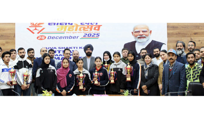 Players posing along with trophies and dignitaries.