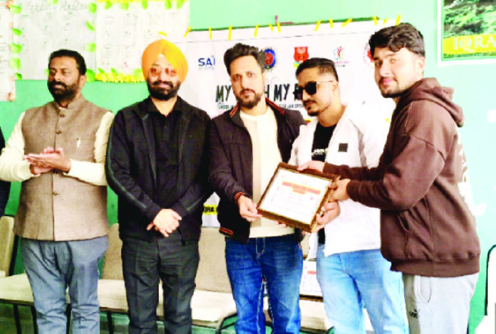 Winner receiving award during an award ceremony.