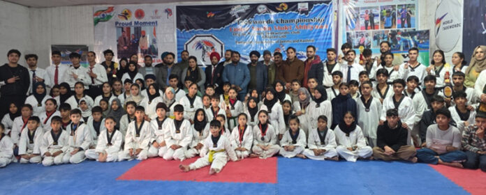 Winners posing along with dignitaries during prize distribution programme.