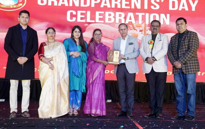 School Management presenting memento to dignitary during a programme.