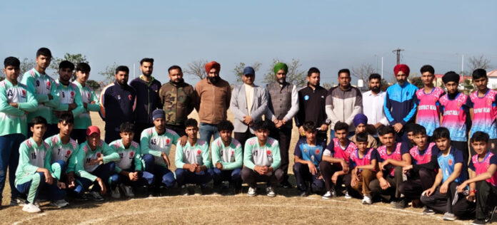 Dignitaries posing along with Softball players. Dignitaries posing along with Softball players.