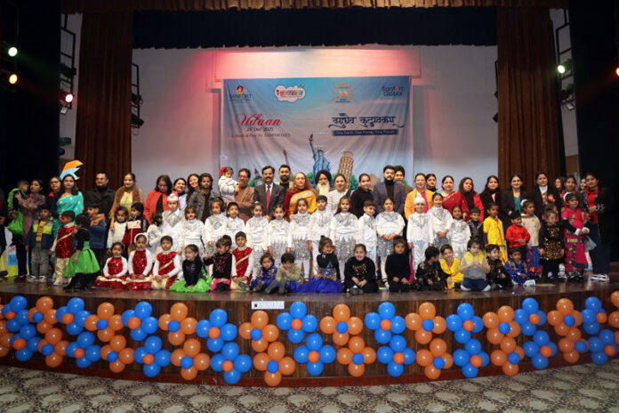 Kindergarteners of Sanfort Preschool posing with dignitaries during Annual Day function in Jammu.