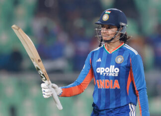 Smriti Mandhana raising her bat after scoring 80 runs against Sri Lanka in Thiruvananthapuram on Sunday.