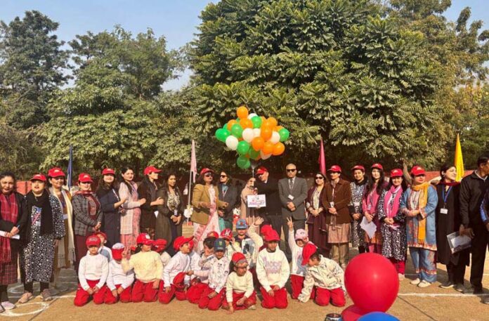 Dignitaries posing during Annual Sports Day of JPS Pre-Primary wing with ceremonial release of tricolour balloons.