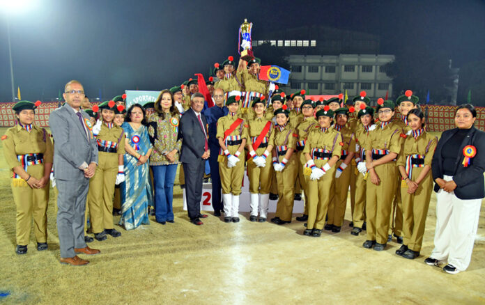 Dignitaries posing along with NCC Cadets during a programme.