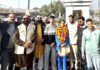 Anekha Devi posing along with MLA Rameshwar Singh and members of Yuva Rajput Sabha in Jammu.