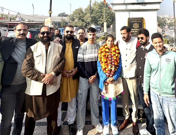 Anekha Devi posing along with MLA Rameshwar Singh and members of Yuva Rajput Sabha in Jammu. Anekha Devi posing along with MLA Rameshwar Singh and members of Yuva Rajput Sabha in Jammu.