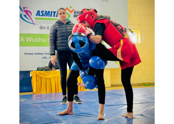 Athletes in action during a match at Asmita City Wushu Women’s League in Jammu on Friday.