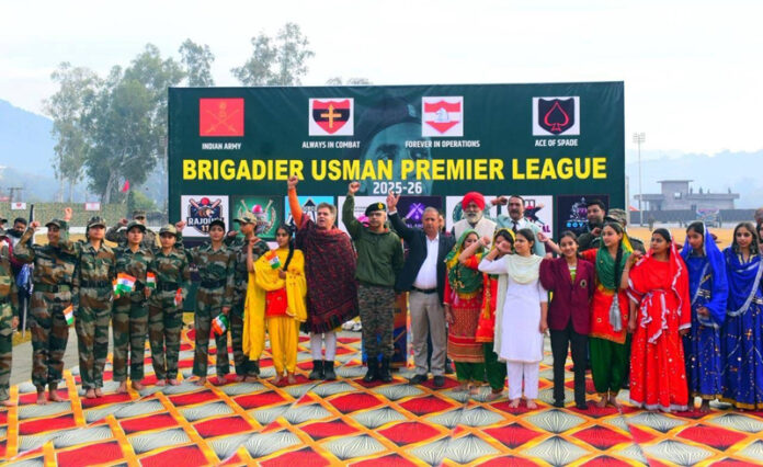 Dignitaries along with students posing for a group photograph during an event. -Excelsior/Imran