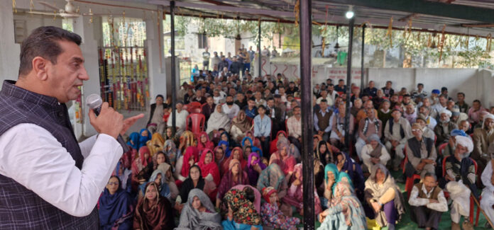MLA Jasrota, Rajiv Jasrotia addressing a public meeting at Jakhole on Friday.