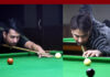 Adnan Lone and Younis Kuchey in action during Snooker match at MA Stadium, Jammu. -Excelsior/Rakesh