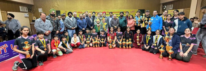 Winners posing along with dignitaries during prize distribution ceremony.