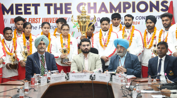 Management of Chandigarh University posing along with medal winners during welcome programme. Management of Chandigarh University posing along with medal winners during welcome programme.