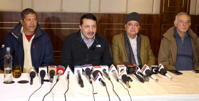 President of Adventure Tour Operators Association of India (ATOAI) Ajeet Bajaj, alongwith other members of the association during a press conference in Srinagar on Friday. —Excelsior/Shakeel