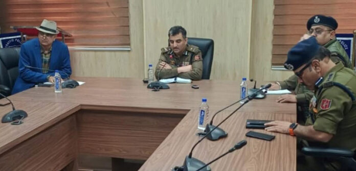 IGP Traffic J&K Mohammad Suleman Choudhary chairing a traffic review meeting in Jammu on Friday.