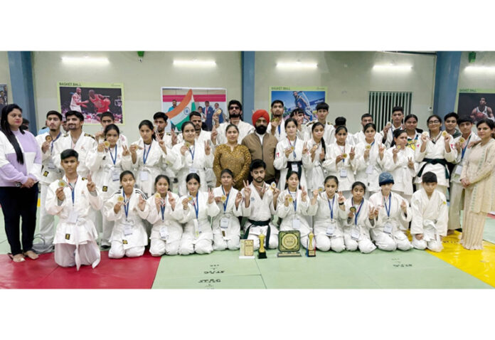 J&K Para Judokas posing along with medals and trophies during prize distribution ceremony. J&K Para Judokas posing along with medals and trophies during prize distribution ceremony.