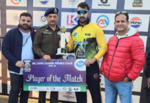 SSP Jammu Joginder Singh presenting Player of the Match award to Jahangir Lone of Royal Goodwill Cricket Club.