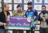 DIG Shiv Kumar Sharma presenting cheque to player of match.