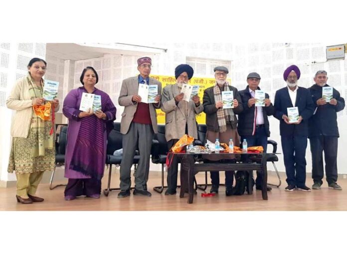 Dignitaries releasing Hindi poetry collection by Dr Chanchal Dogra and Naresh Gulati in Jammu.