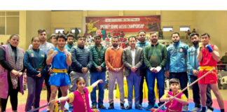 Wushu athletes in action during inaugural event at Jammu.