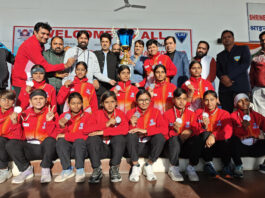 MLA Katra, Baldev Raj Sharma presenting trophy to winning team at Kata.
