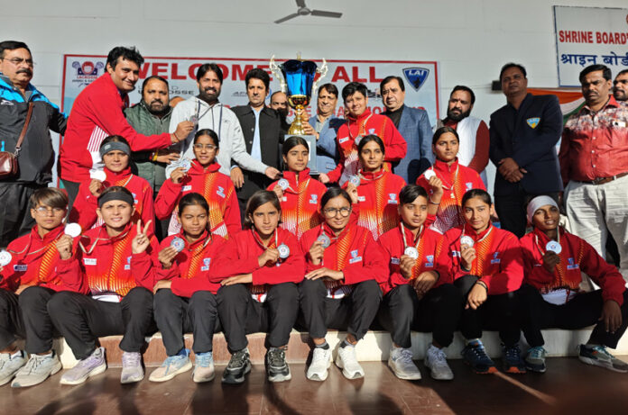 MLA Katra, Baldev Raj Sharma presenting trophy to winning team at Kata. MLA Katra, Baldev Raj Sharma presenting trophy to winning team at Kata.