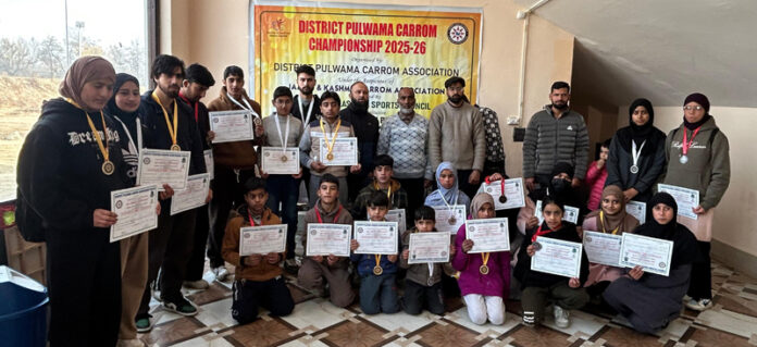 Players posing along with certificates and medals.