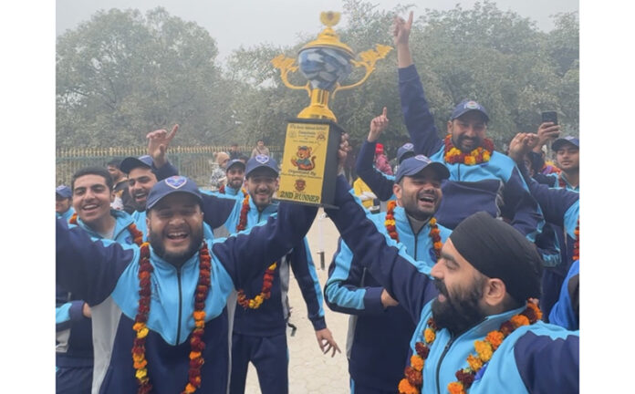 J&K Men's Softball Team posing with trophy.