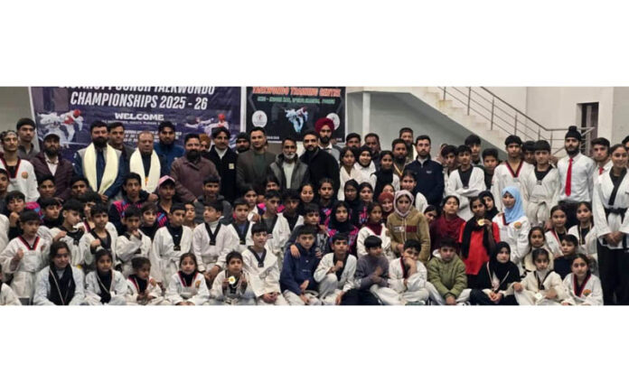 Medal winners posing along with dignitaries for a group photograph. Medal winners posing along with dignitaries for a group photograph.