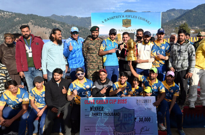 Winning team posing along with trophy and dignitaries. -Excelsior/Tilak Raj