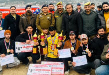 Dignitaries posing along with winners during prize distribution ceremony. -Excelsior/Tilak Raj
