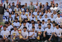 MP Jugal Kishore Sharma posing along with winners during a programme.
