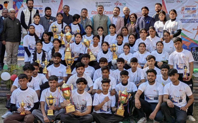 MP Jugal Kishore Sharma posing along with winners during a programme.