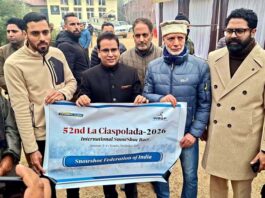 MLA Zadibal Tanvir Sadiq flagging off Muzamil Hussain Mir of Srinagar for international snowshoe running event in Italy.