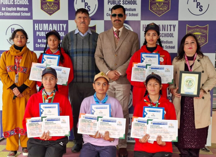 Students posing with certificates along with school management. Students posing with certificates along with school management.